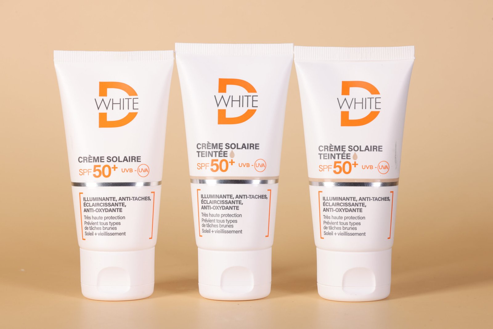 DWHITE Crème Solaire SPF 50+ : Votre Allié Beauté Contre le Soleil Marocain